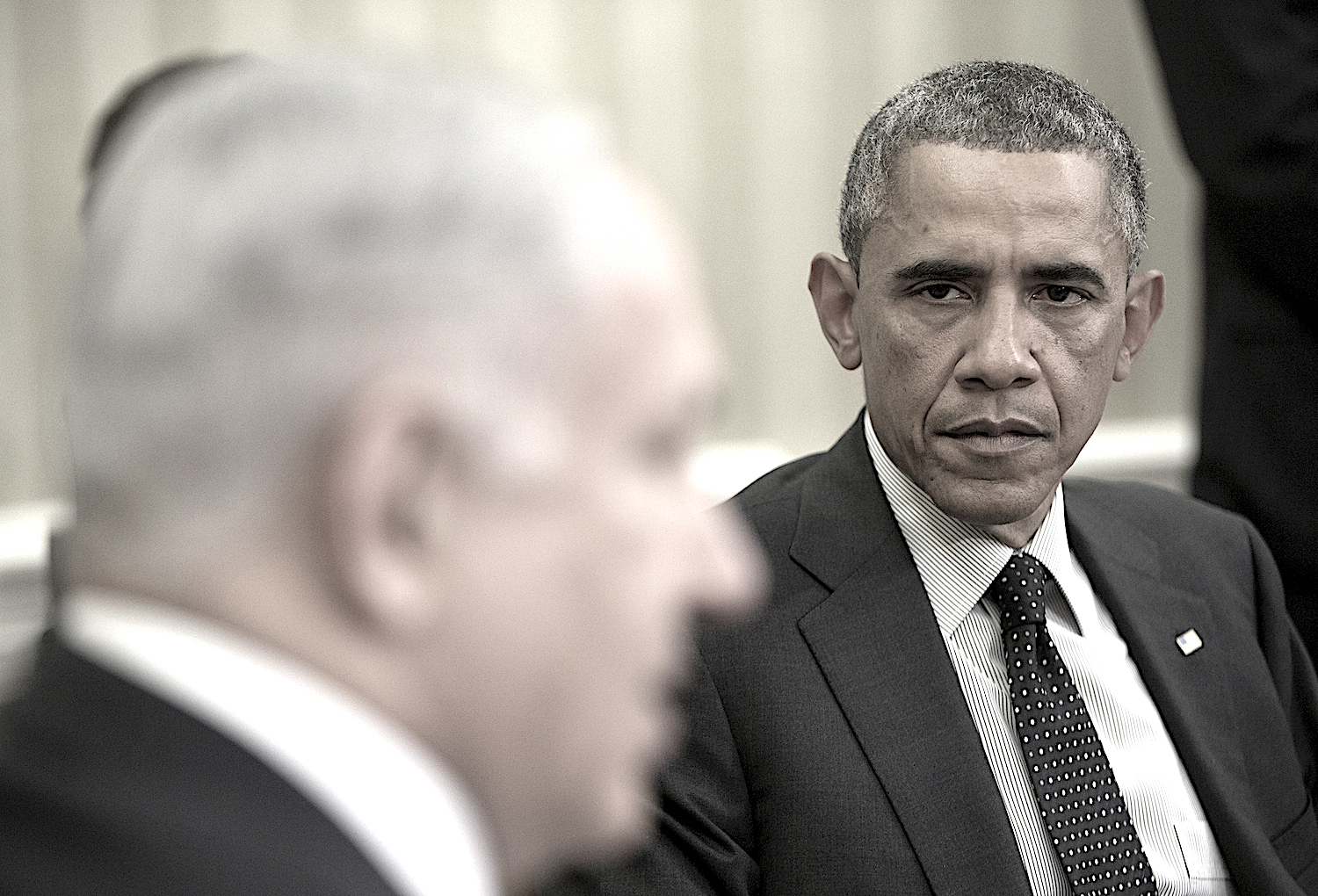 President Barack Obama listens as Israeli Prime Minister Benjamin Netanyahu speaks during their meeting in the Oval Office of the White House in Washington, Wednesday, Oct. 1, 2014. President Barack Obama and Israeli Prime Minister Benjamin Netanyahu met for the first time since a rash of civilian casualties during Israel's summer war with Hamas heightened tensions between two leaders who have long had a prickly relationship. (AP Photo/Pablo Martinez Monsivais)