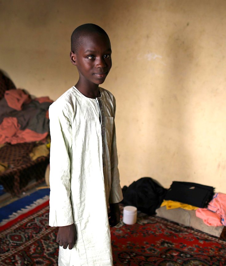 Living on Scraps, Boy Who Fled Boko Haram Yearns to Heal the Poor | The New York Times