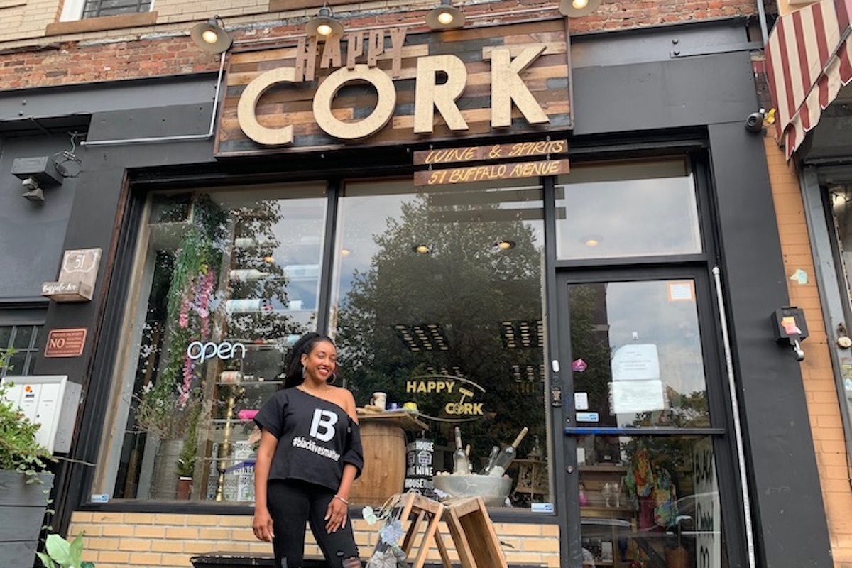 Inside Happy Cork: The Black-Owned Brooklyn Shop Giving Black Wine And Spirit Brands A Home | Travel Noire