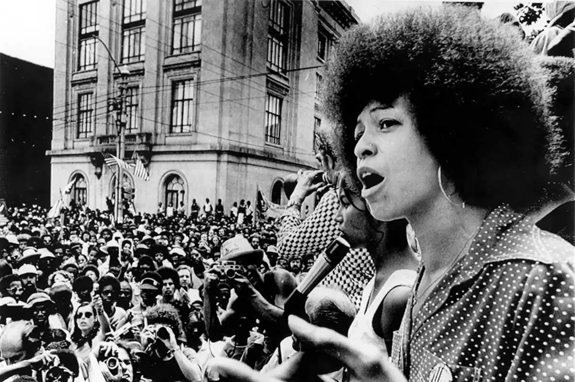 Angela Davis, African American News, Black News, Urban News, African American Newspaper, Black Newspaper, African American Magazine, Black Magazine, African American History, Black History, African American Wealth, Black Wealth, African American Health, Black Health, African American Economics, Black Economics, KOLUMN Magazine, KOLUMN Books, KINDR'D Magazine, Black Lives, Black Lives Matter, African American Art, Black Art, African American Politics, Black Politics, African American City, Black City, African American People, Black People, Allegory, Segregation, Racism, Reparations