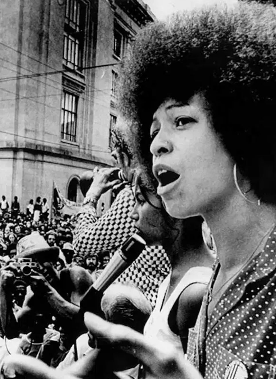 Angela Davis, African American News, Black News, Urban News, African American Newspaper, Black Newspaper, African American Magazine, Black Magazine, African American History, Black History, African American Wealth, Black Wealth, African American Health, Black Health, African American Economics, Black Economics, KOLUMN Magazine, KOLUMN Books, KINDR'D Magazine, Black Lives, Black Lives Matter, African American Art, Black Art, African American Politics, Black Politics, African American City, Black City, African American People, Black People, Allegory, Segregation, Racism, Reparations